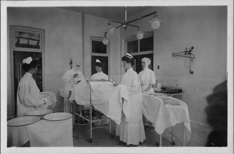 Nurses and surgeon working in O.R.