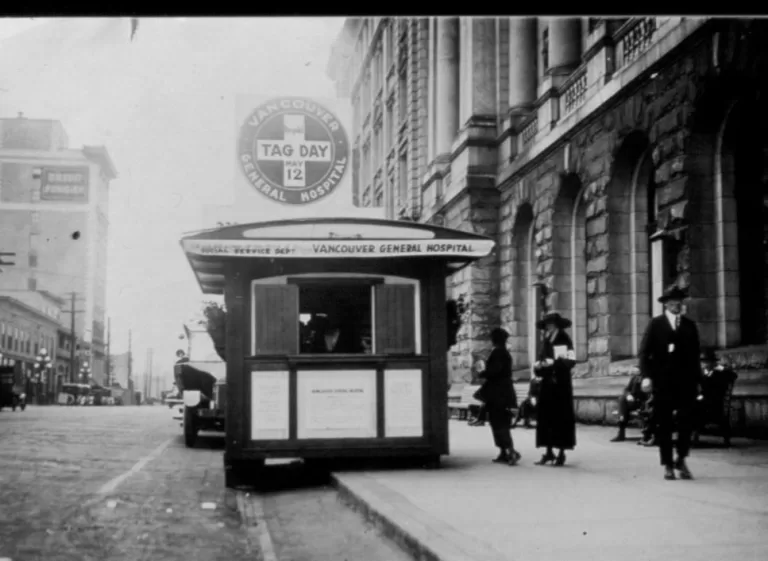 Booth set up by nurses for Tag Day in 1917. Primarily staffed by women volunteers, gentlemen were able to purchase tags to be worn on the clothing that indicated that they participated in this institution of civic generosity. Some later tag days were run to provide funding for civic initiatives, but the institution is primarily associated with the type of fundraising currently conducted through the sale of poppy pins.