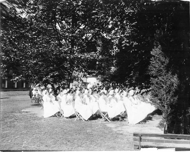 Nurses at a lecture on the Johns Hopkins lawn.